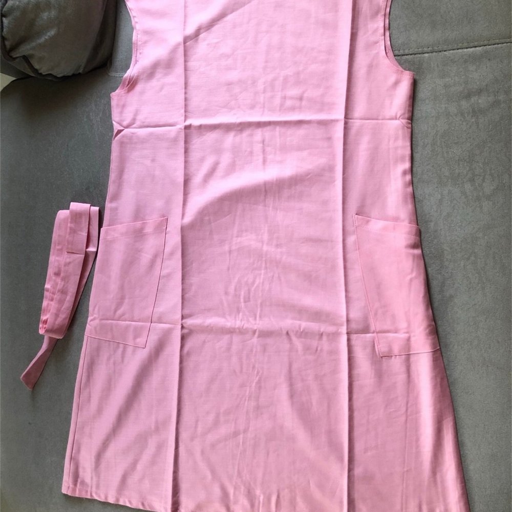 Pink sleeveless skirt with waist strap for women